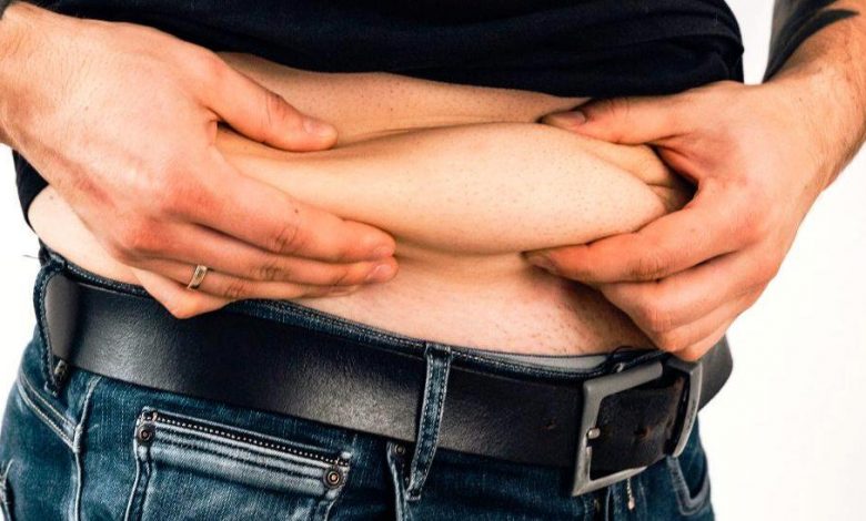 Man showing his stomach