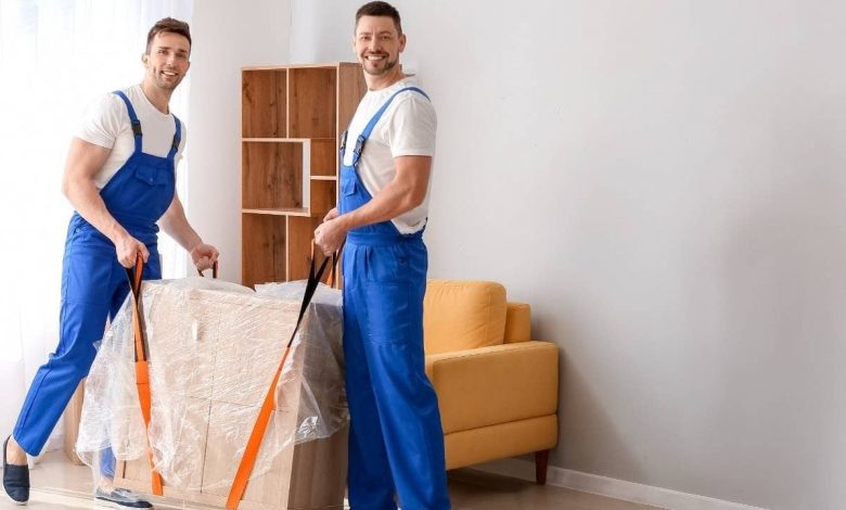 Guys taking apart furniture