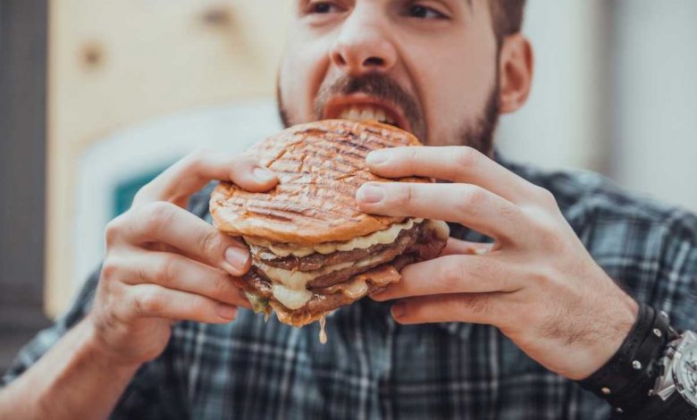 A guy binge eating