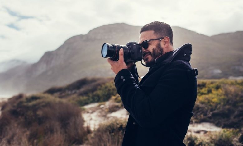 A person taking a photograph