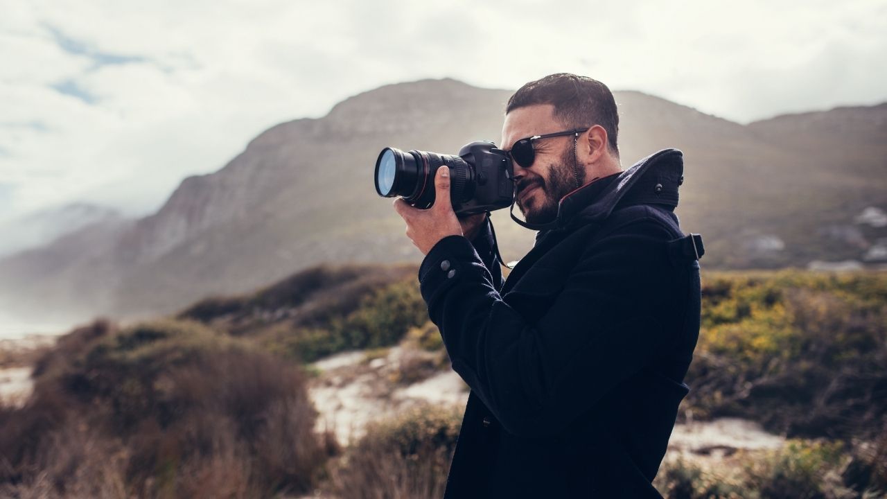 A person taking a photograph