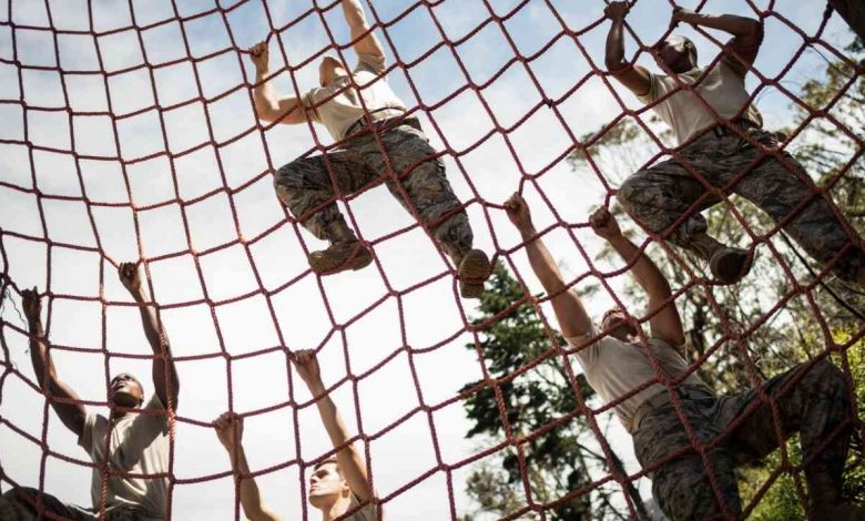 Military Soldiers Climbing rope
