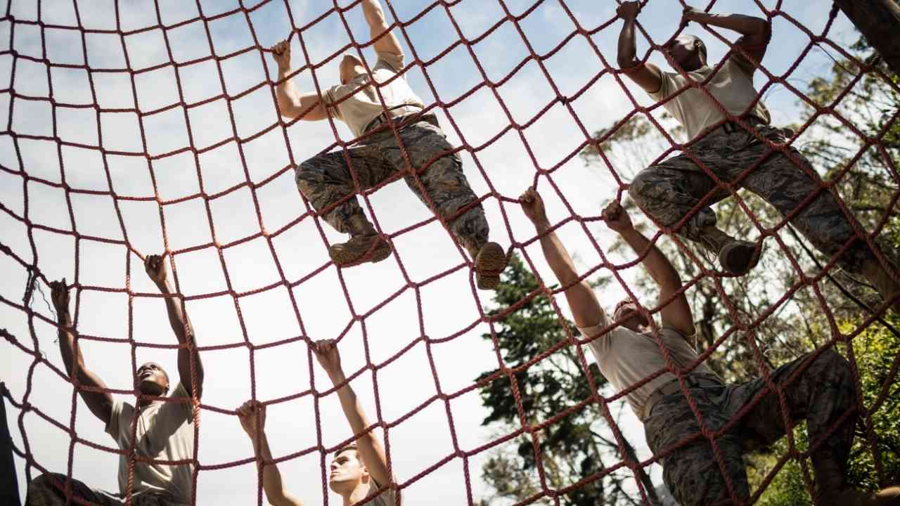 Military Soldiers Climbing rope