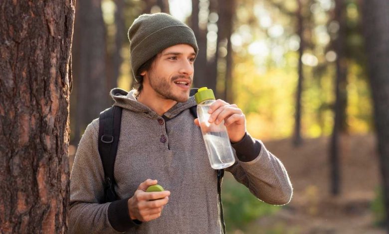 A guy drinking water
