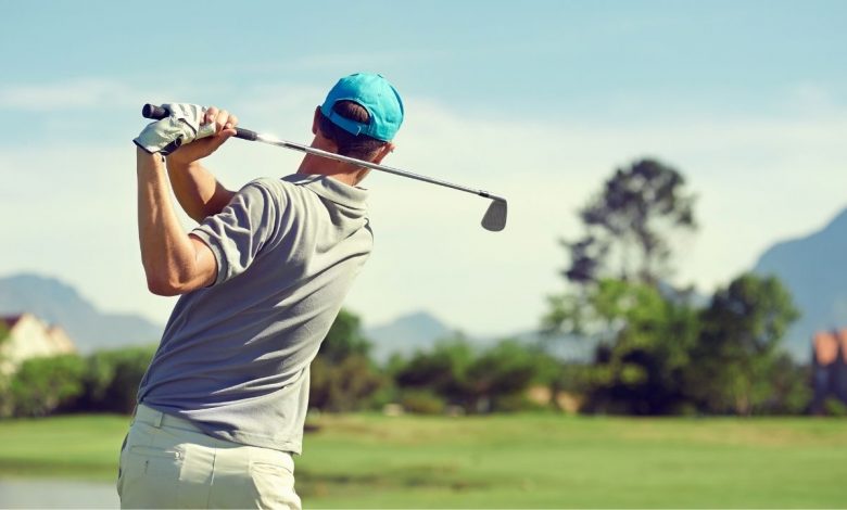 Guy playing golf