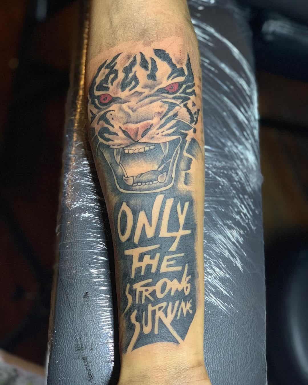 32 Incredible Only The Strong Survive Tattoo Designs