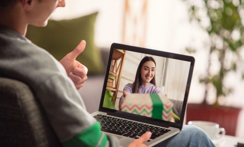 A guy using webcam on a macbook