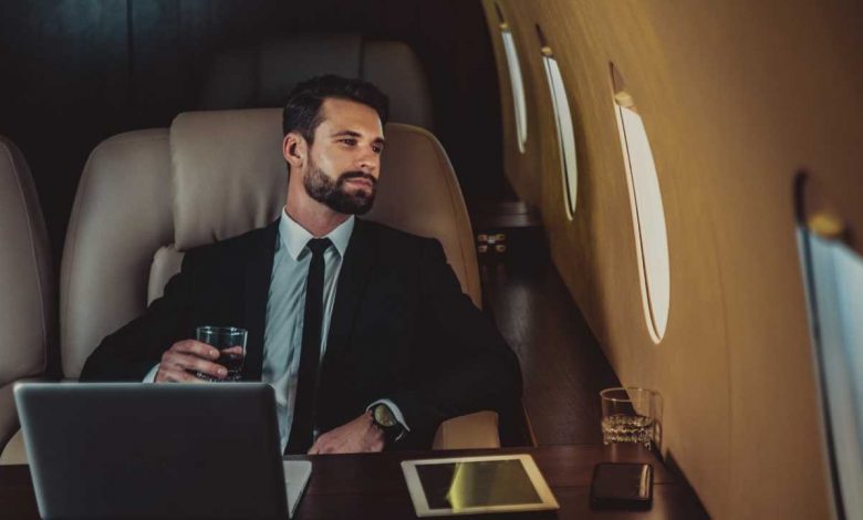 A guy sitting in a private jet