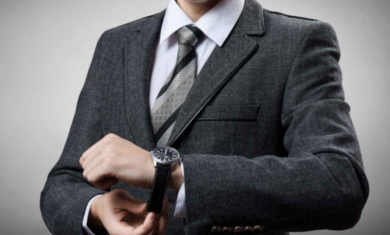 A guy wearing a dress watch