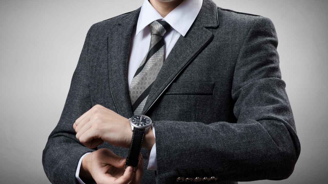 A guy wearing a dress watch