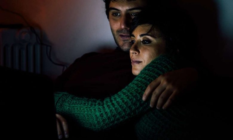couple watching laptop