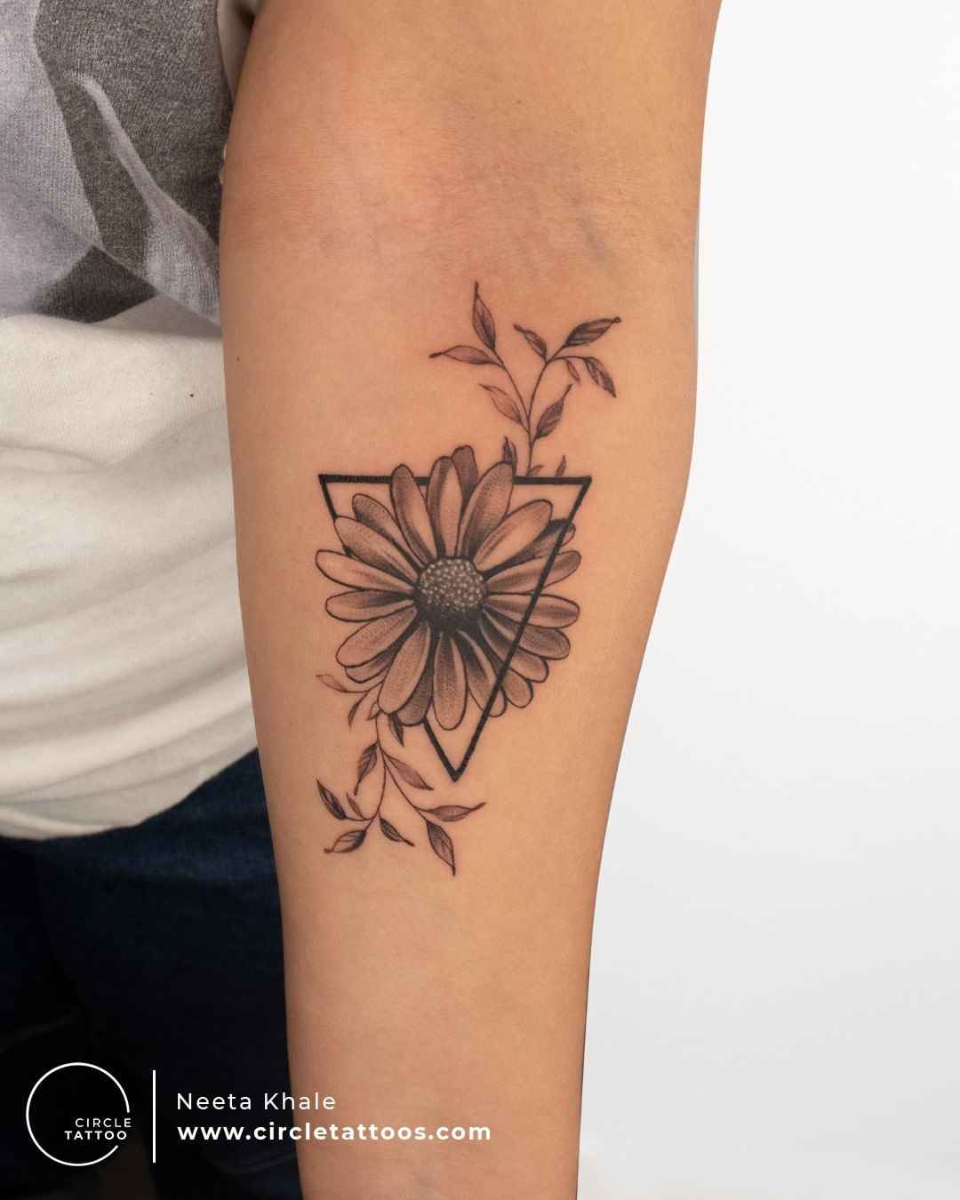sunflower tattoo on forearm