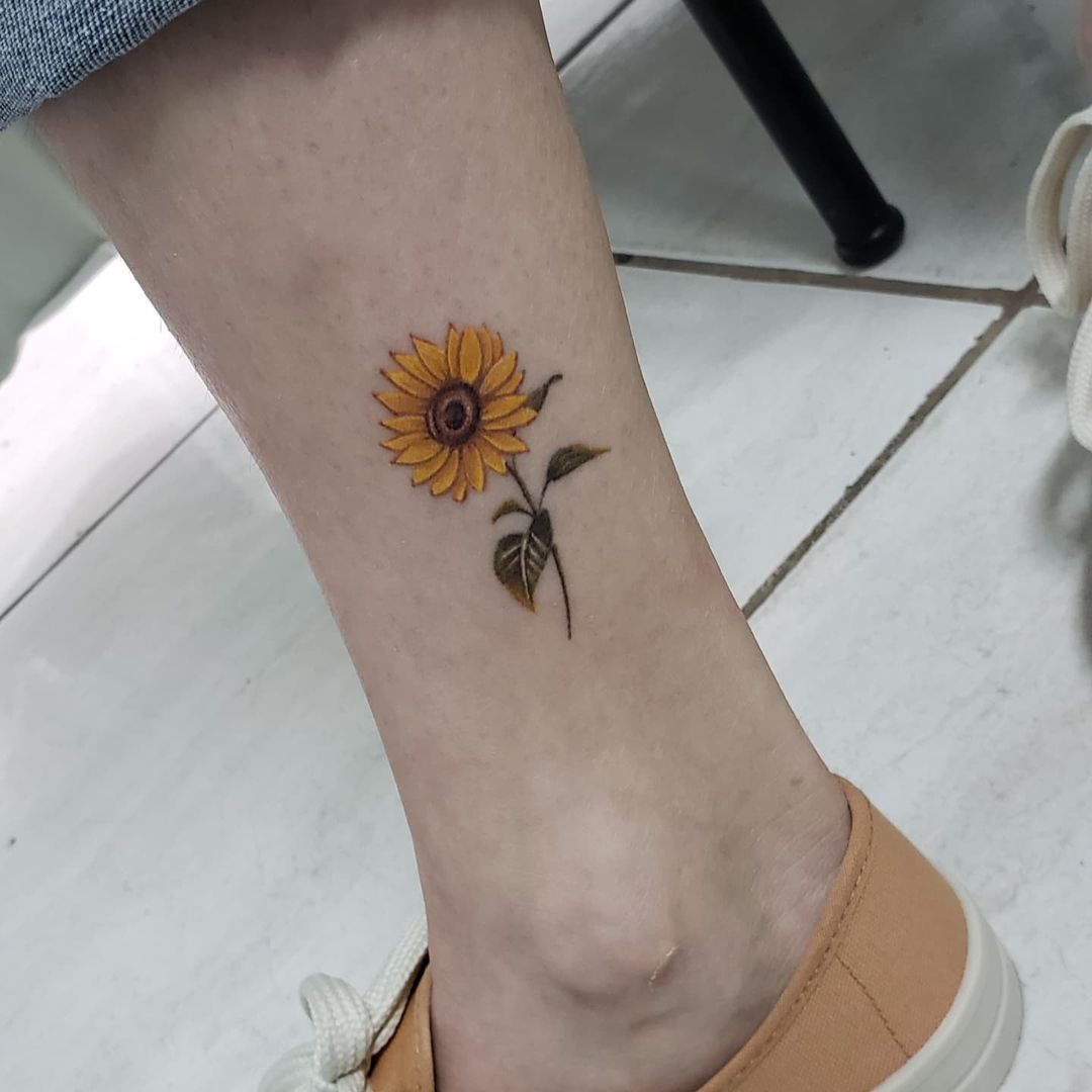 sunflower tattoo on leg