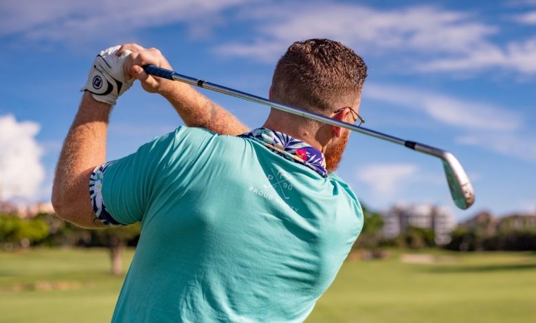 A guy playing golf
