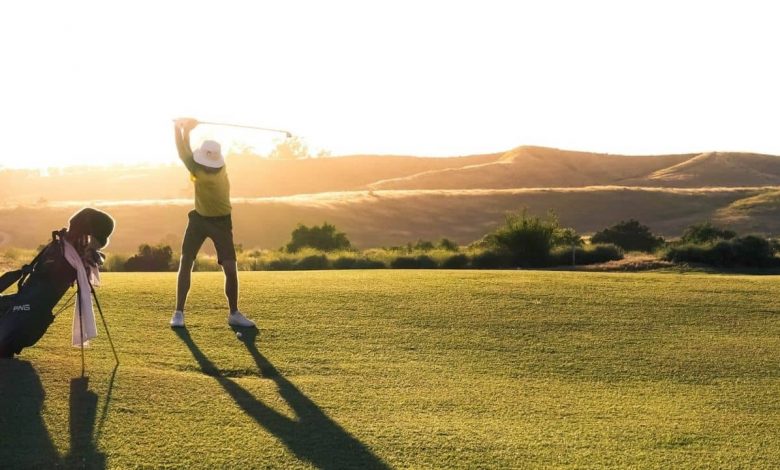Guy playing golf