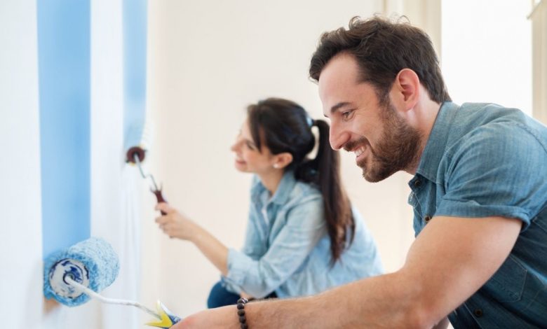 couple painting walls