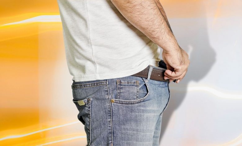 Guy checking between legs