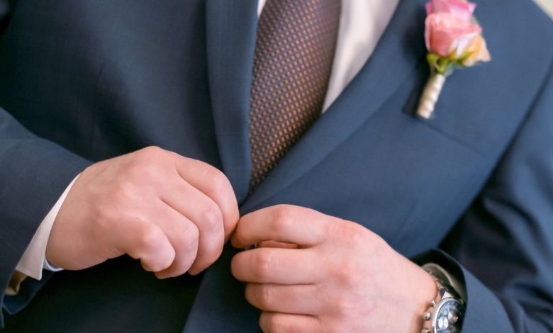 Guy in suit attending a wedding
