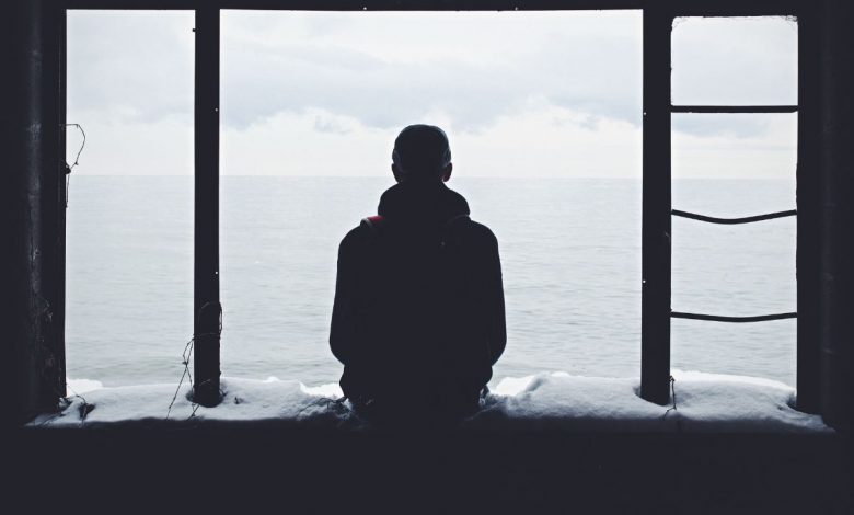 Guy sitting alone