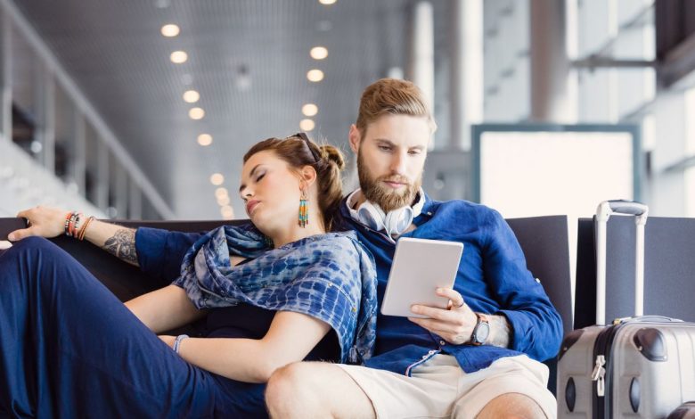 Couple waiting for their flight delay