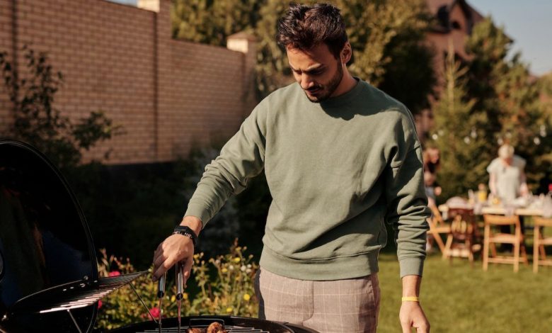 Guy grilling