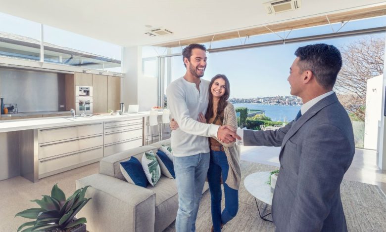 couple with real estate agent