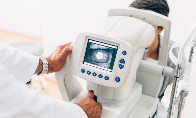 Eye Doctor checking eyesight of a patient