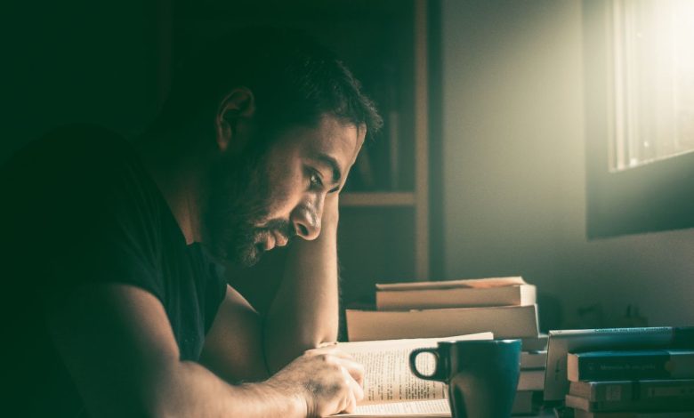 guy man reading book
