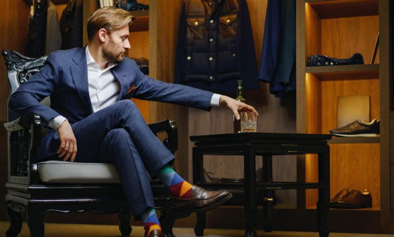 guy wearing a suit and watch