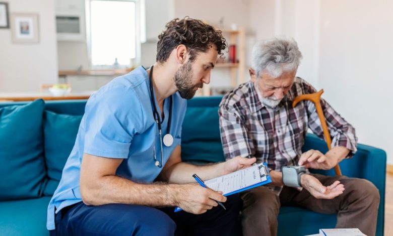 male nurse looking after a patient