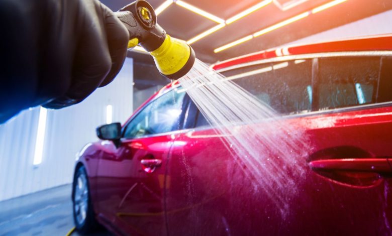 Car service technician working on a vehicle to keep it in top shape for resale