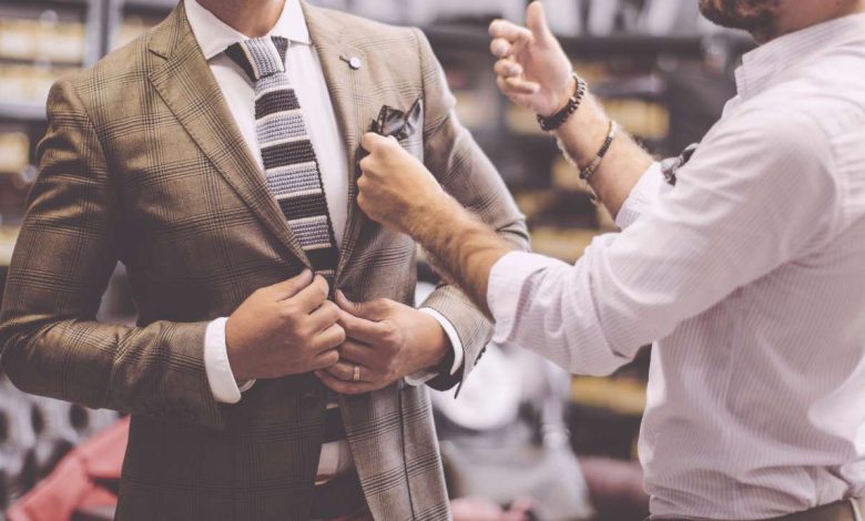 Personal stylist carefully selecting pieces to create a fashionable look for their client