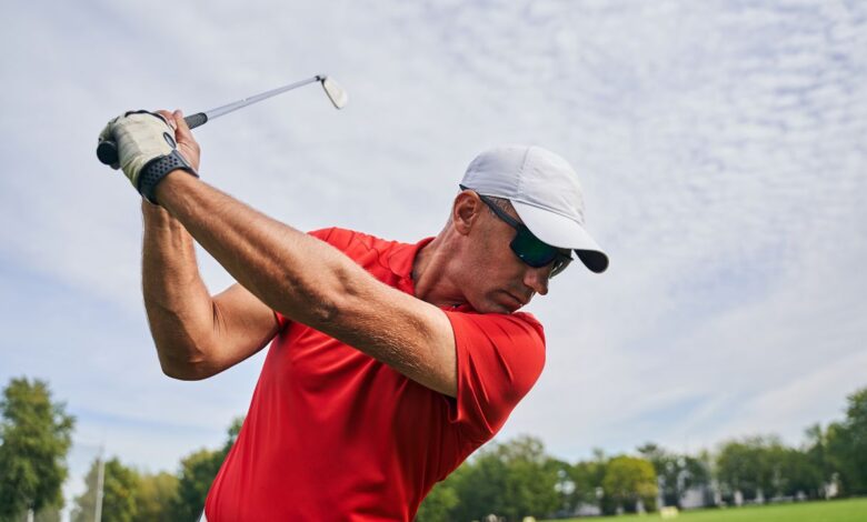 male golfer doing a gold swing