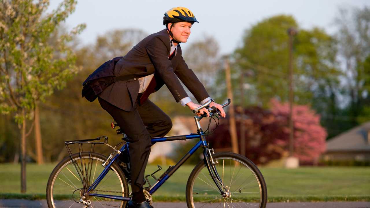 a guy going to work via Bicycle commute