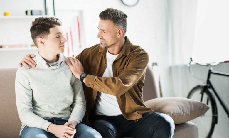 Teenager with his father