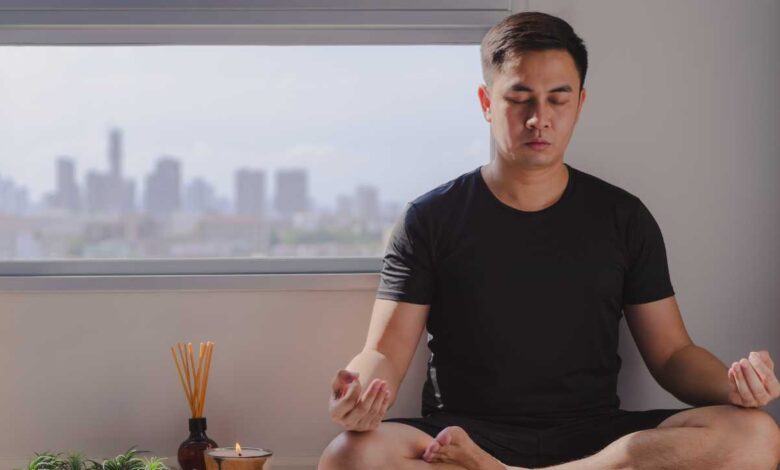calm guy meditating