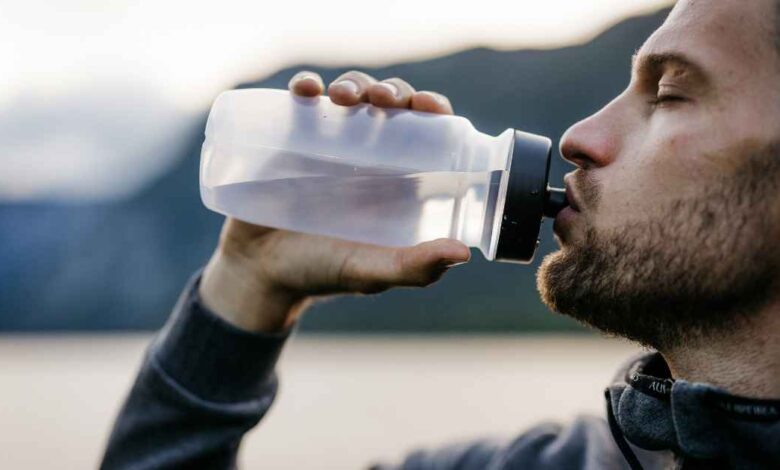 runner getting hydrated