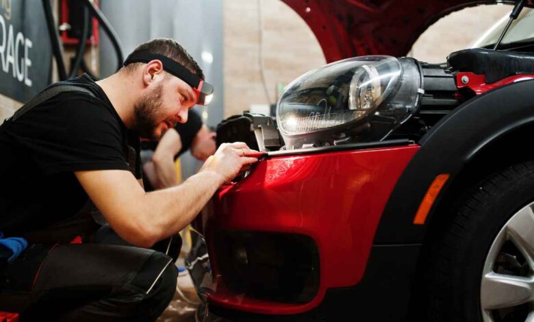 mechanic working on a car