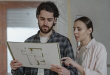 Contractor looking at map