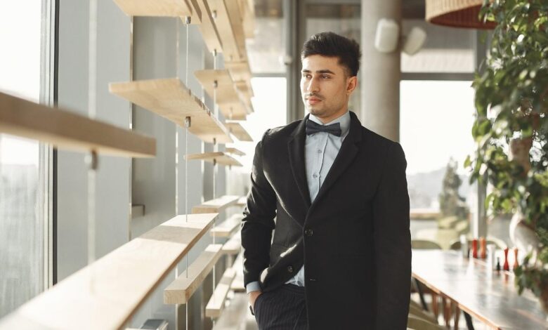 man in black suit