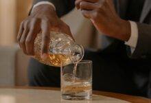 man pouring Whisky