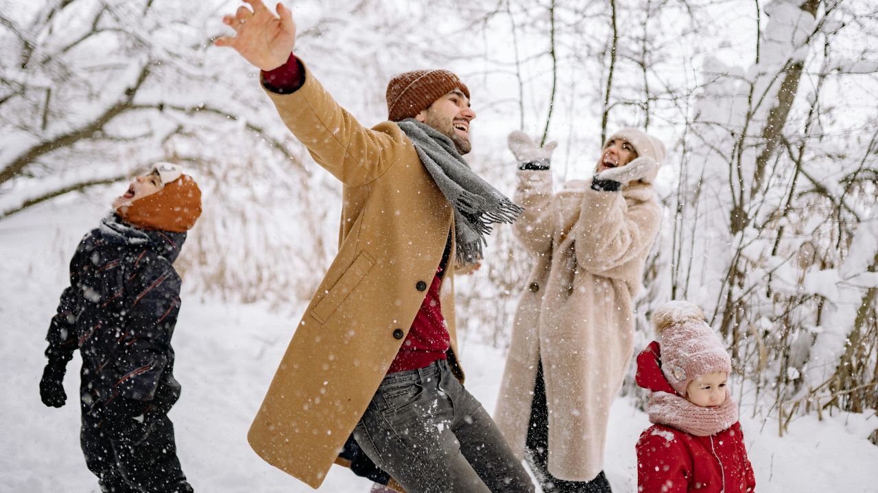 Family enjoying in snow