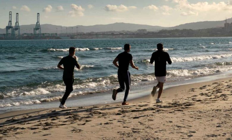 Men near sea