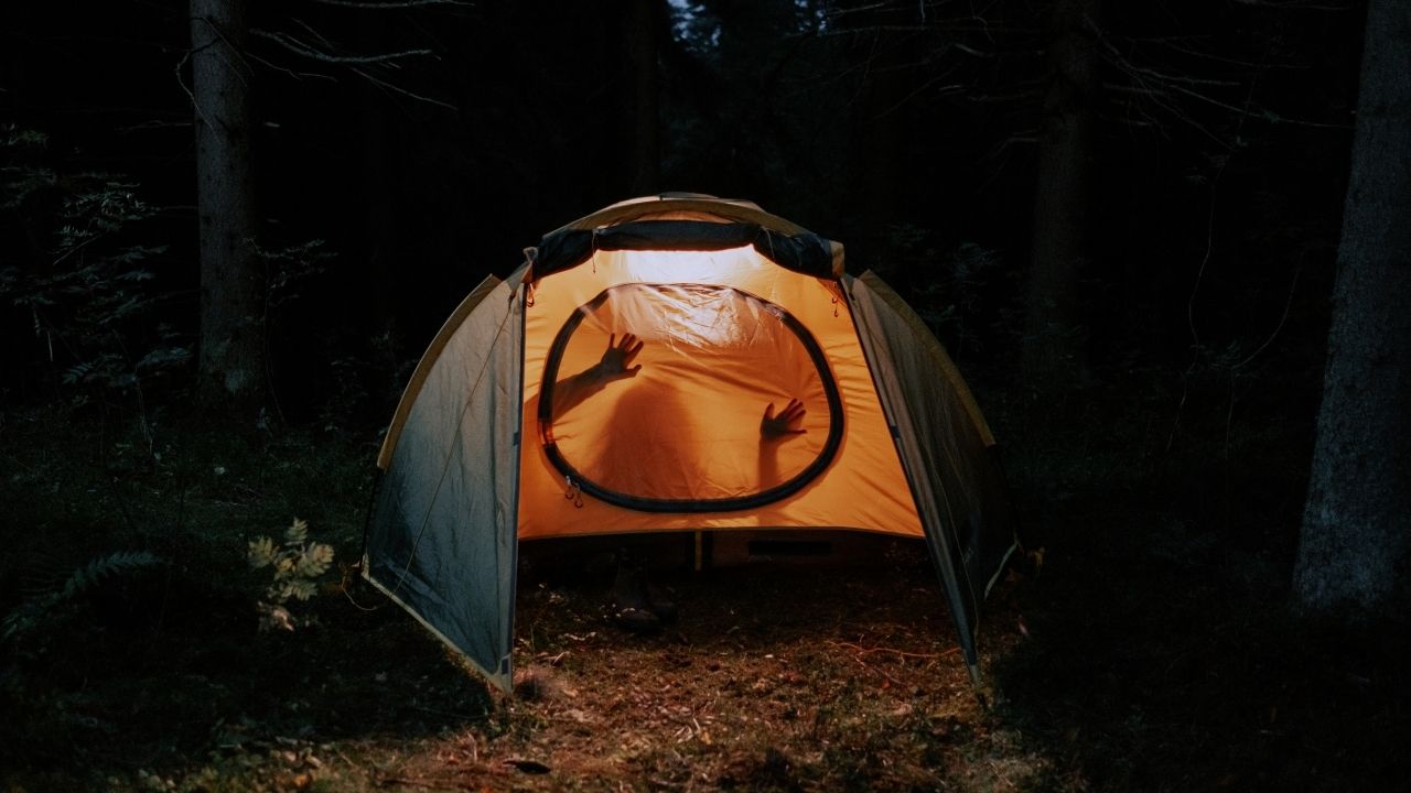 person inside a tent
