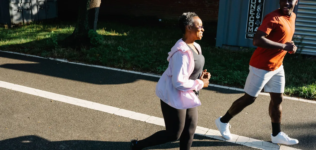 man and woman jogging to maintain a healthy weight