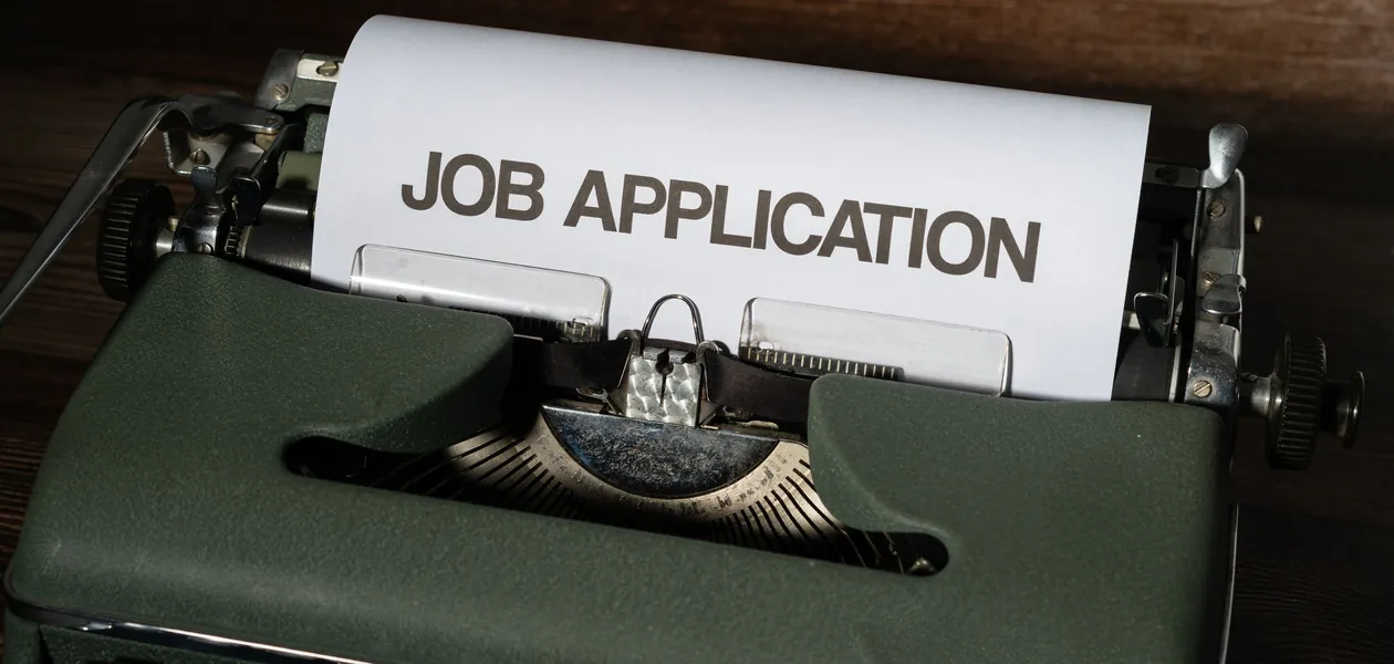 job application form on a vintage typewriter