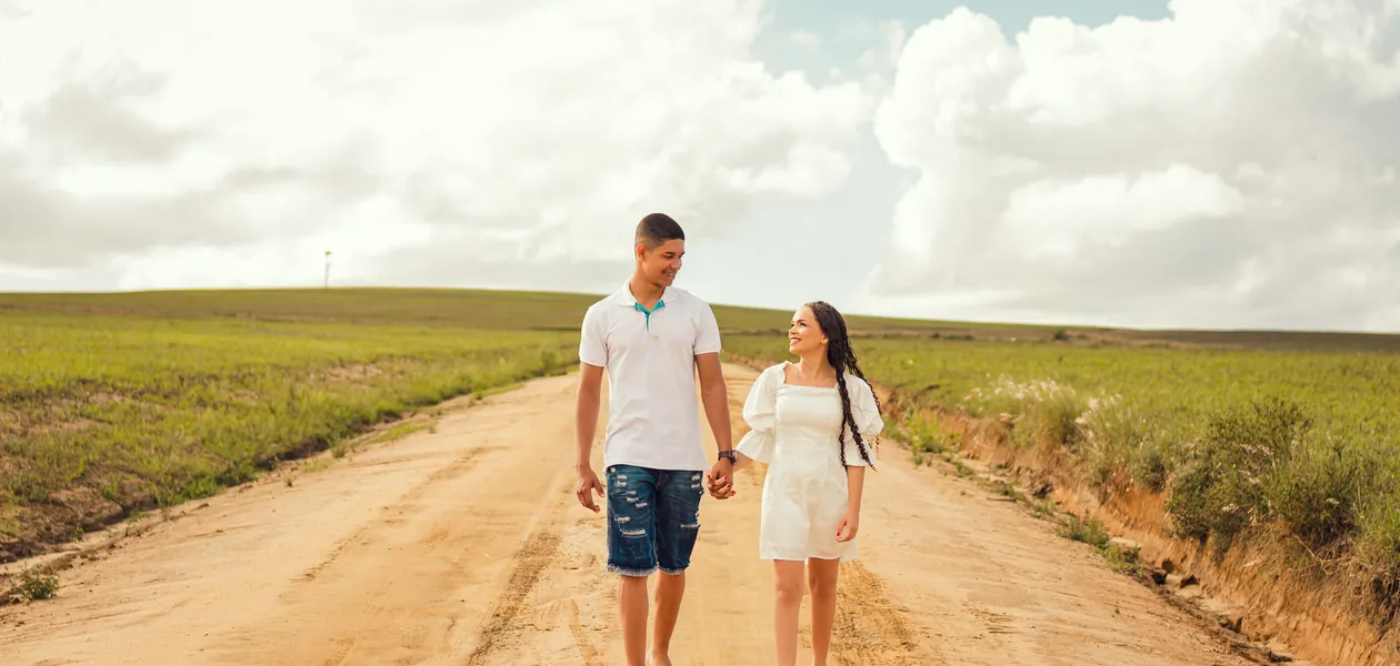 compatible couple walking hand in hand