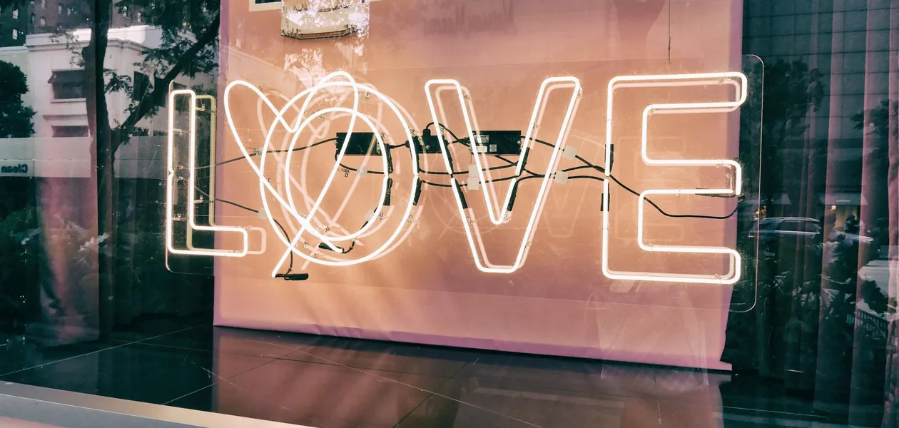 neon love sign in a city window