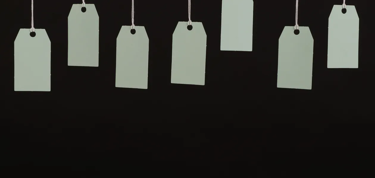 price tags hanging on strings