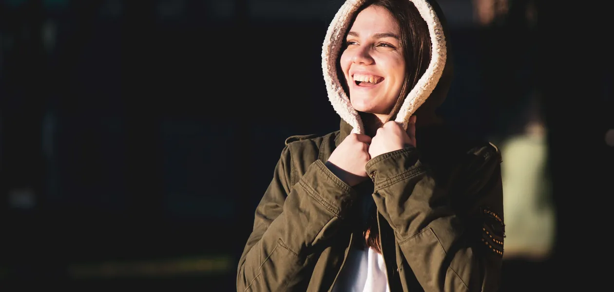 Smiling woman enjoying a sunny day